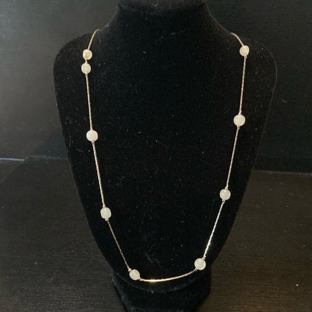 Elegant Gold and White Necklace